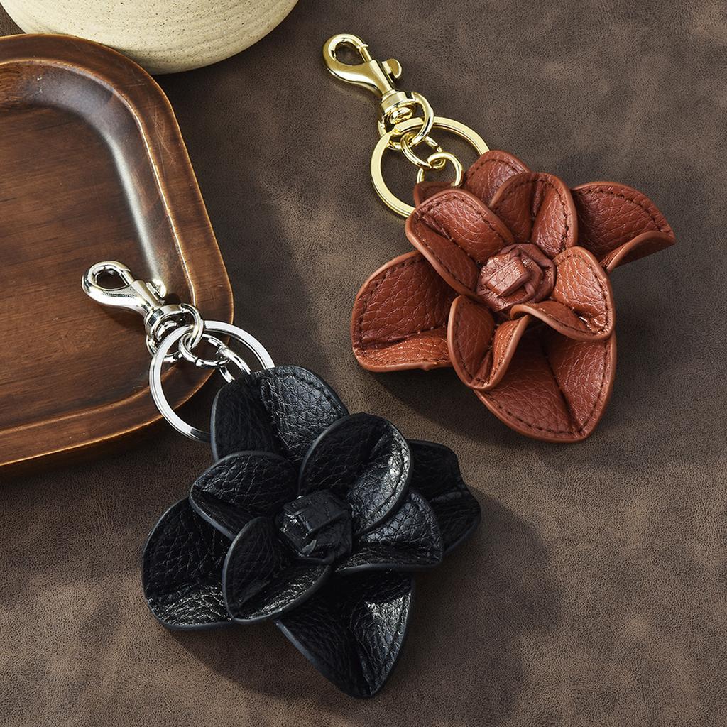 Eleganter Kaffee-/Schwarzer Ton PU-Leder Blumen-Schlüsselanhänger Stilvoller Schlüsselanhänger mit stabilem Metallring für stilvolle Männer und Frauen