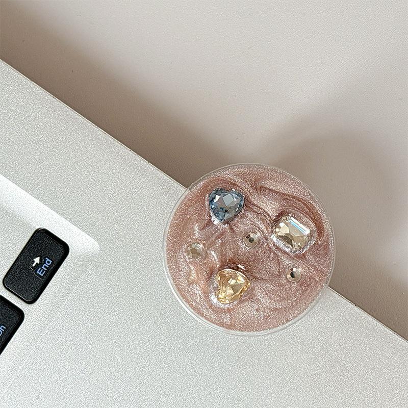 Vibrant Rhinestone & Gem Phone Grip: Magnetic, Retractable Airbag Holder and Finger Ring for Hands-Free Viewing.