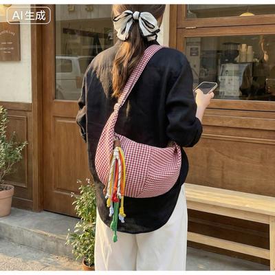 Version coréenne de sac à bandoulière simple en nylon nouveau style étranger sac boulette à carreaux polyvalent décontracté sac messager léger femmes