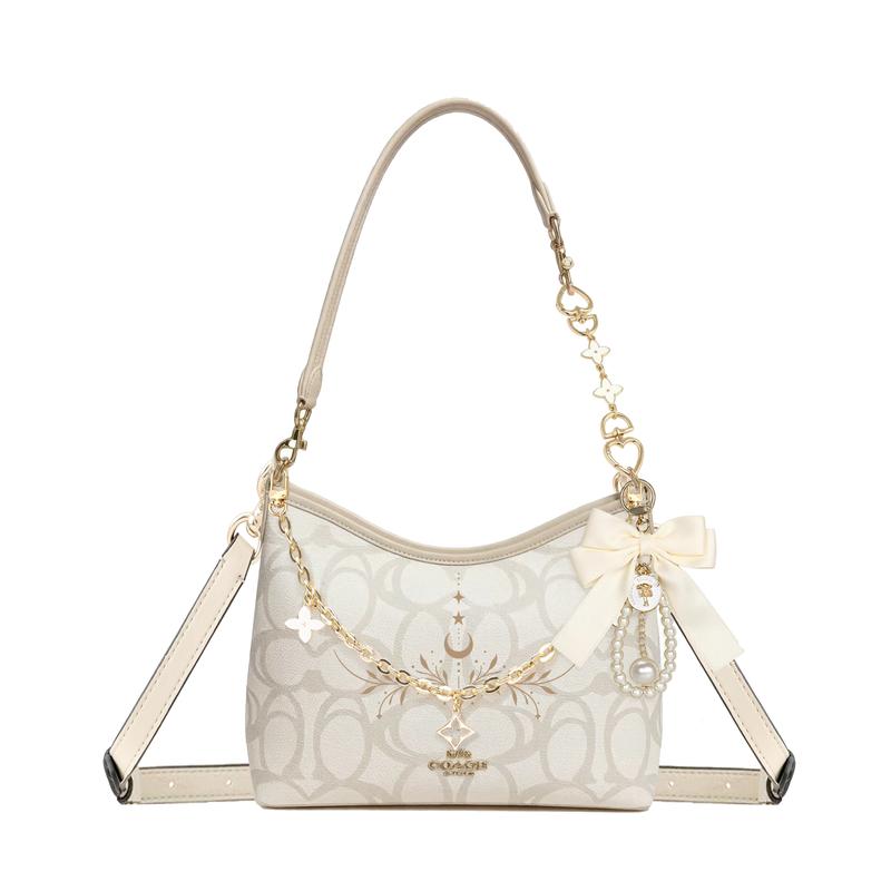 

COACH shoulder bag [Customized bag] Laurel Signature 31 brand print gold accessories doll bow pearl chain coated canvas large Lime Time Basic Style золотий