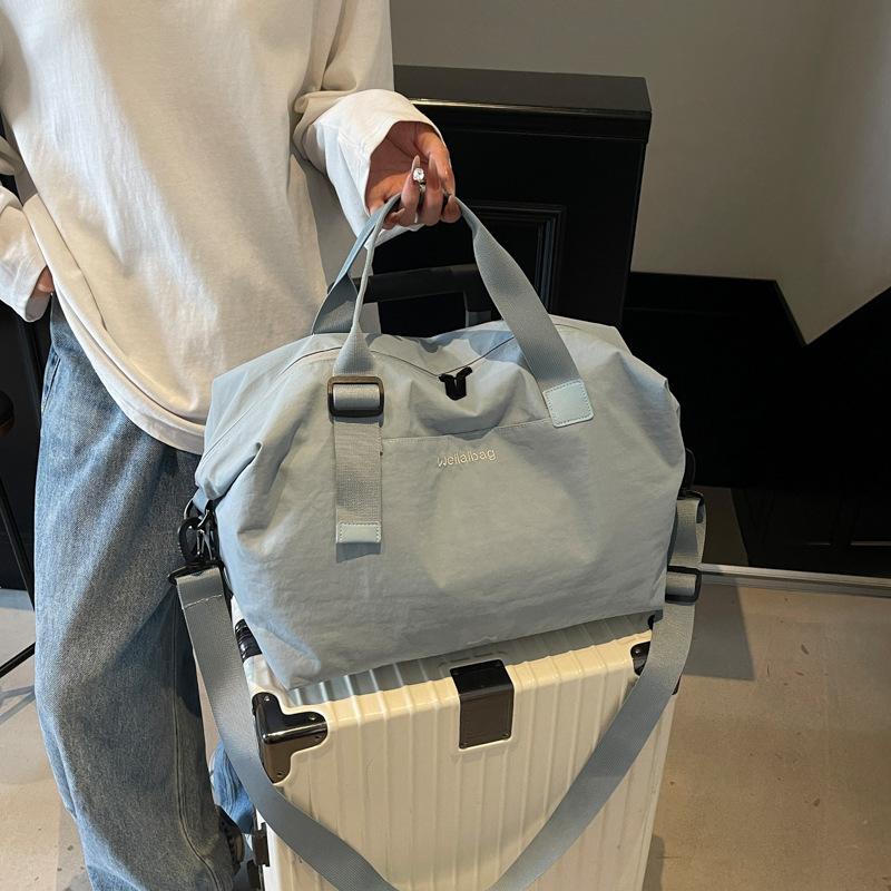 Short-haul general travel bag, simple business trip boarding bag, trendy fitness yoga bag, Hong Kong style commuter messenger bag