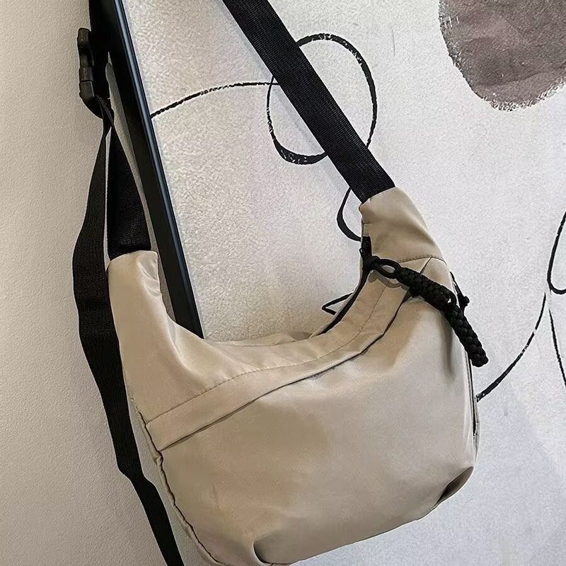 

2025 Новая сумка из ткани Оксфорд, сумка-мессенджер на каждый день, женская повседневная на плечо, для поездок на работу, сумка-пельмень, большая вместительная сумка-тоут Khaki [recommended height: 150-165cm]]