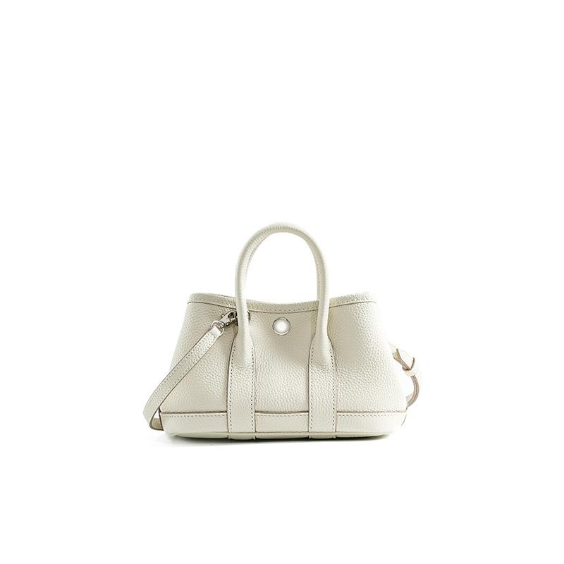 The First Layer of Cowhide Leather Shoulder Messenger Bag Is Small, Exquisite and Small Bag, Niche High-end Office Worker Handbag Bag.