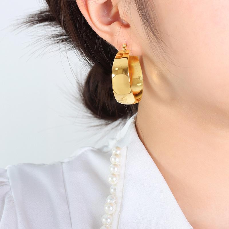 European-American Vintage Asymmetrical Round Titanium Steel Earrings for Women
