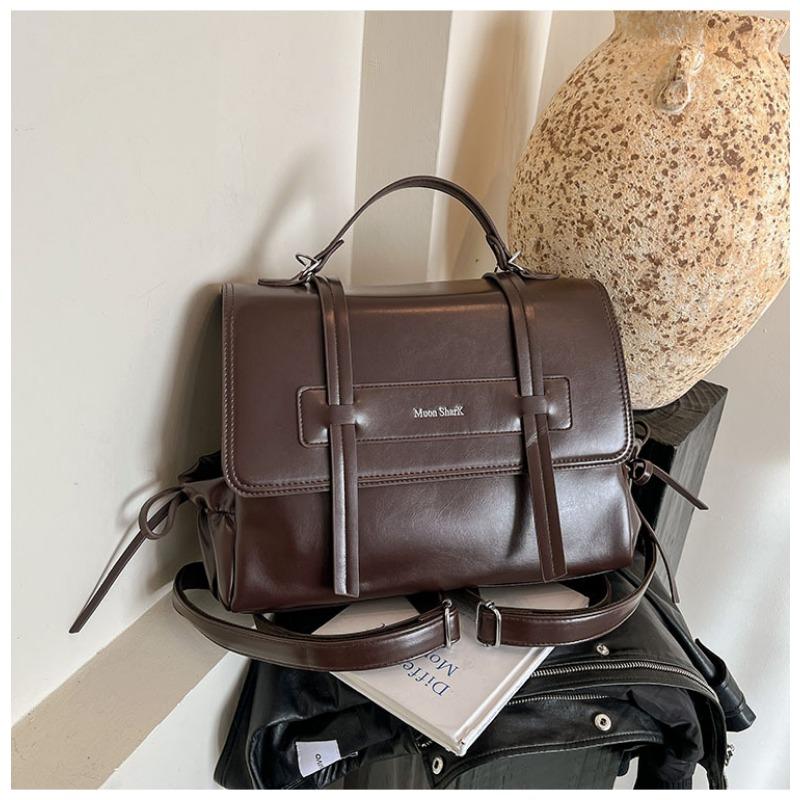 

Retro solid color soft leather new fashion versatile large capacity commuting shoulder bag broadband messenger bag