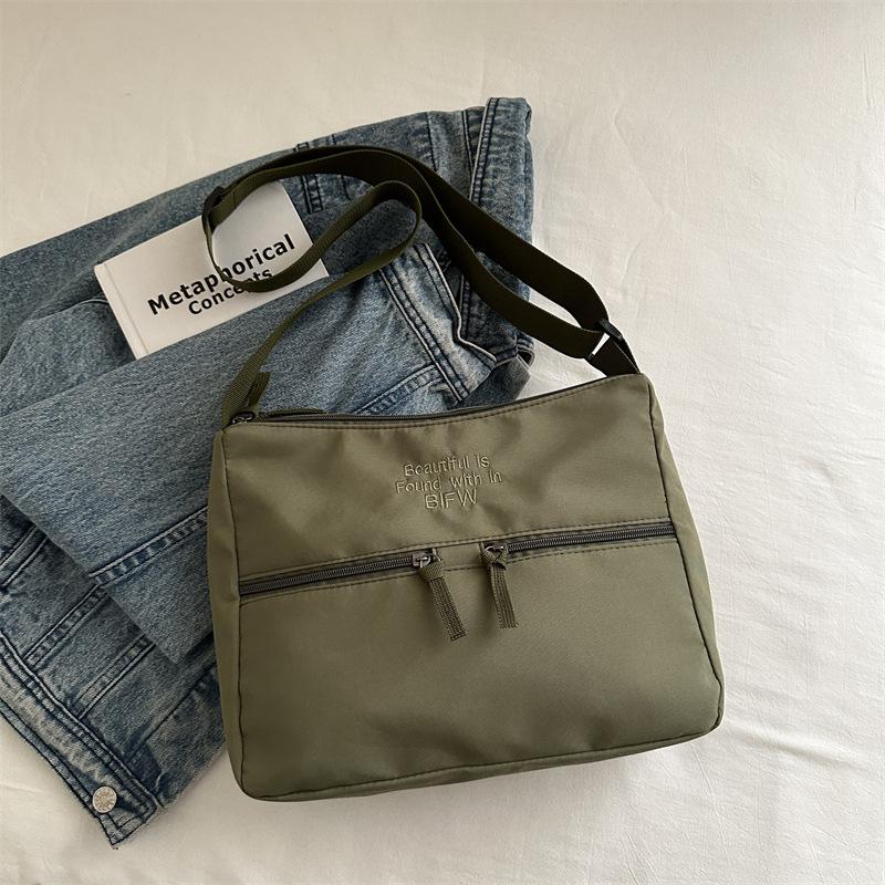 2025 spring new casual light cloth bag Japanese style solid color simple letter shoulder bag crossbody high value