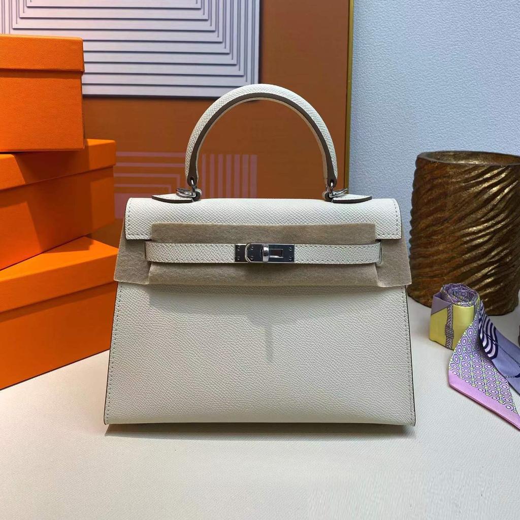 Grenzüberschreitende Hersteller Großhandel Damenhandtaschen 2023 neue Handtaschen aus Leder mit Palmenmuster tragbare Schulter-Umhängetaschen Damenhandtaschen große Kapazität