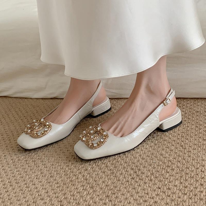 Leather shallow mouth low heel rhinestone sandals women's spring 2025 new bag head back empty word with sandals