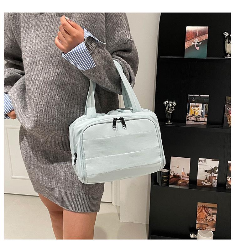 Women's 2025 Multi-Functional Cross-Border Handbag: Large Capacity Fashion Cosmetic & Toiletry Bag with Portable Partition Storage.