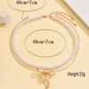 Elegant Faux Pearl & Metal Bow Pendant Necklace for Women