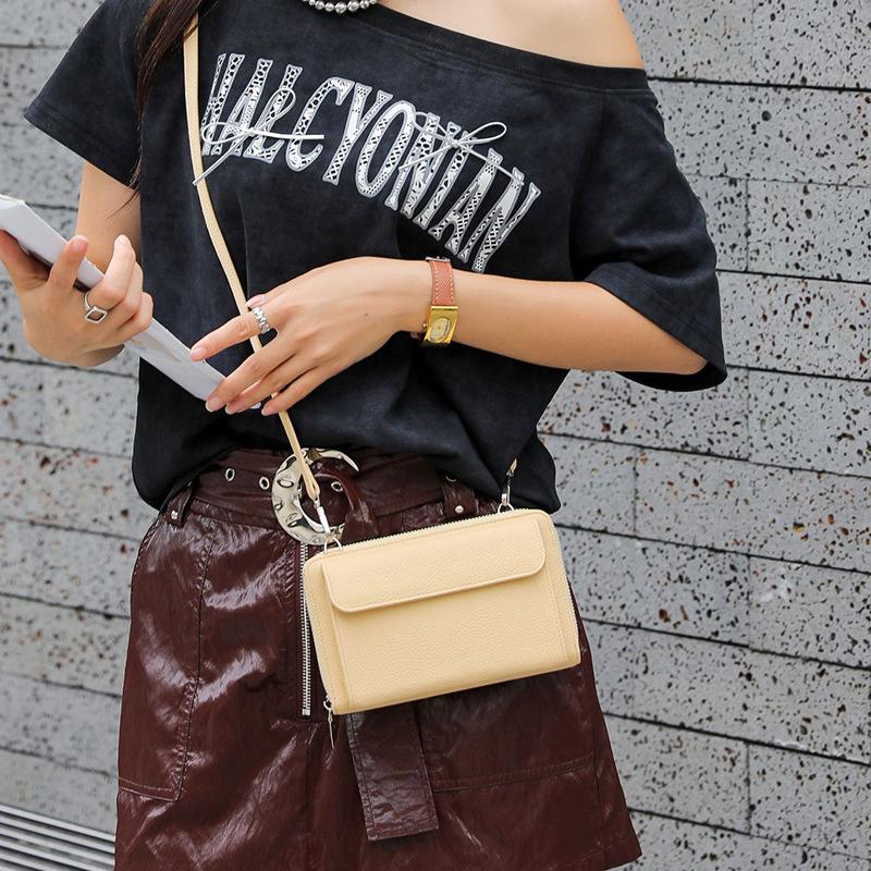 First layer cowhide shoulder messenger bag New women's mobile phone bag Simple and fashionable key bag Small square bag