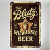 Vintage Milwaukee Beer Metal Tin Sign with Strawberry Star, Dark Brown Background & Yellow Border, Retro Distressed Man Cave Hom