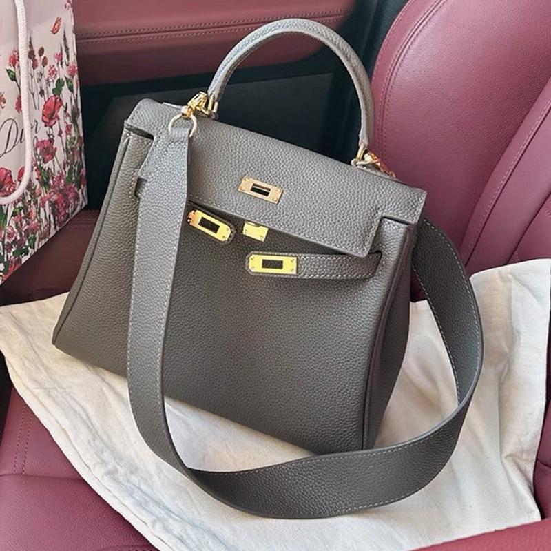 2026 nova bolsa de couro togo com alça larga para ombro, bolsa de mão de couro bovino de primeira camada, bolsa feminina original para ombro único e transversal