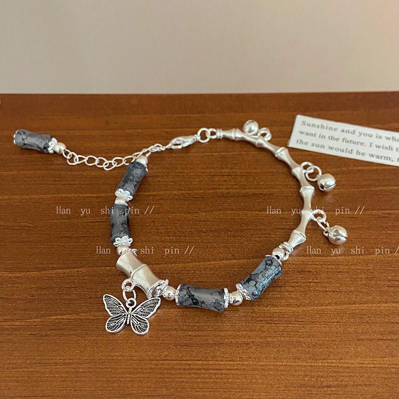 

Butterfly Beaded Bracelet - A Niche Design with A Cyberpunk Style, Resembling Jadeite and Featuring Bamboo-shaped Bells.