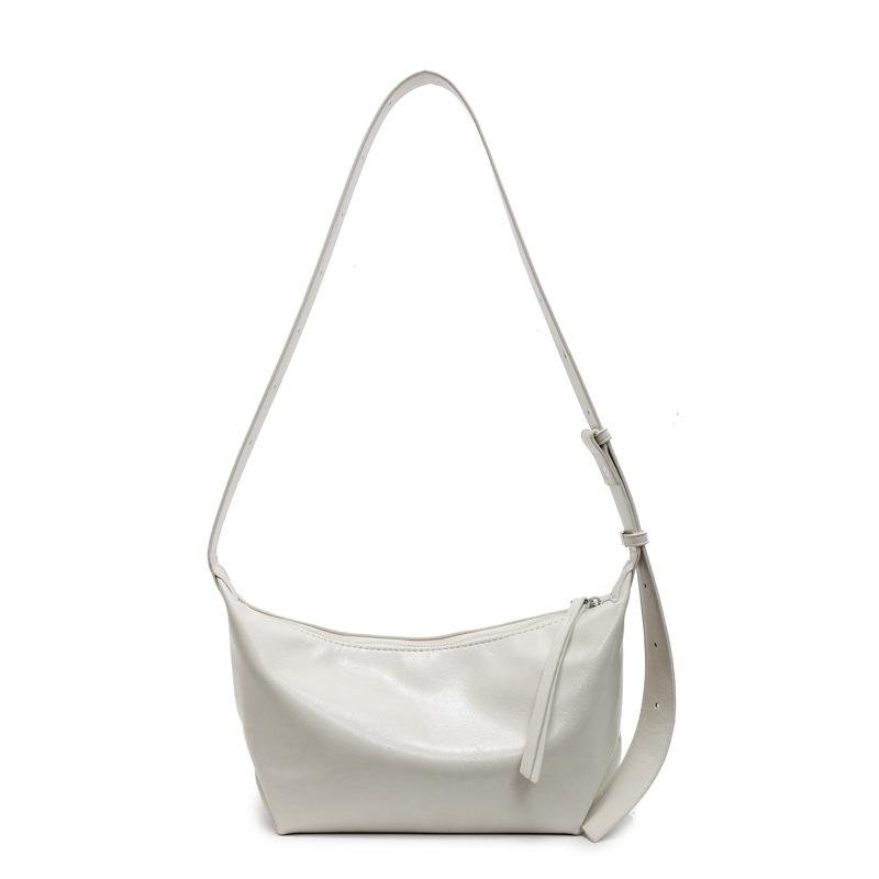 Móda a populární ležérní jednobarevná ležérní jednoduchá přenosná podpažní taška přes rameno nová taška ve tvaru knedlíku