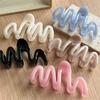 Fluid Wave Silhouette Hair Clip In Dreamy Translucent Hues Provides Secure Hold For Messy Buns And Modern Minimalist Updos