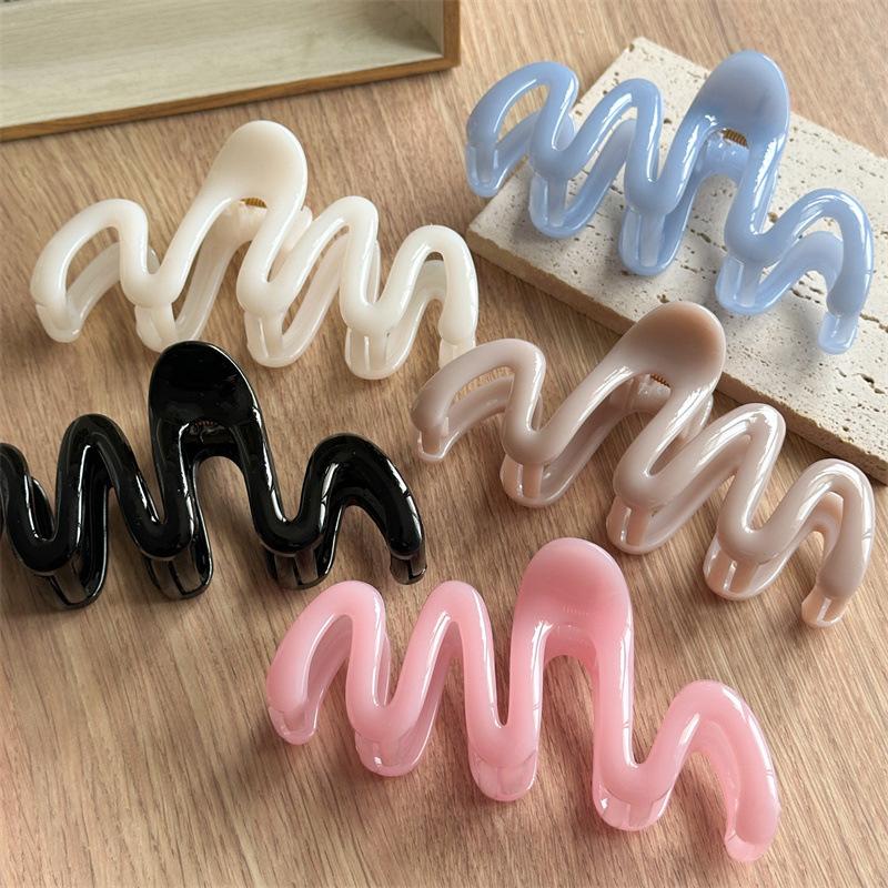 Fluid Wave Silhouette Hair Clip In Dreamy Translucent Hues Provides Secure Hold For Messy Buns And Modern Minimalist Updos