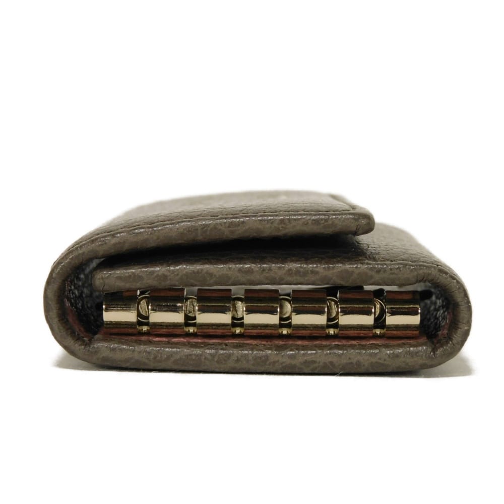 Used 6-ring keychain (product numbers 9539, 354499, CAO2G, 2160, 7949) in pink with a two-tone snap button and cursive