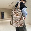 Schoolbag high-value trendy brand fashionable simple graffiti versatile schoolbag 3rd to 6th grade junior high school student backpack