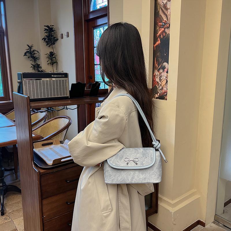 Simple and fashionable bow underarm bag 2025 new niche high-end commuter shoulder oblique span bag
