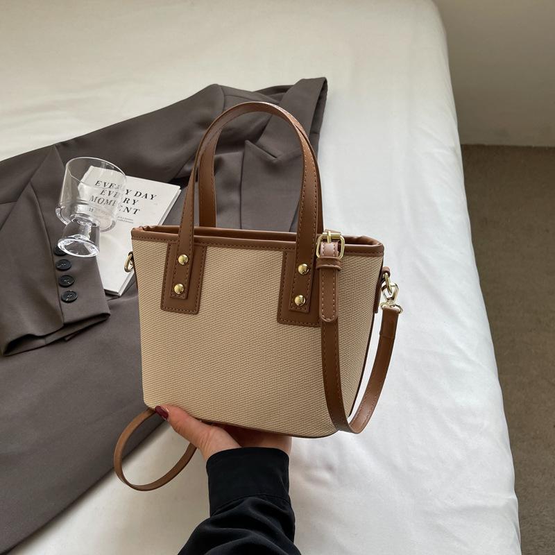 Autumn new fashionable and simple contrasting color vegetable basket bag portable shoulder oblique span trendy women's bag