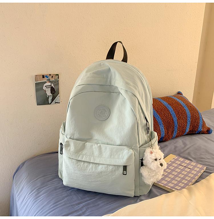 School bag Japanese simple solid color backpack light commuting large capacity student school bag casual versatile outdoor travel backpack