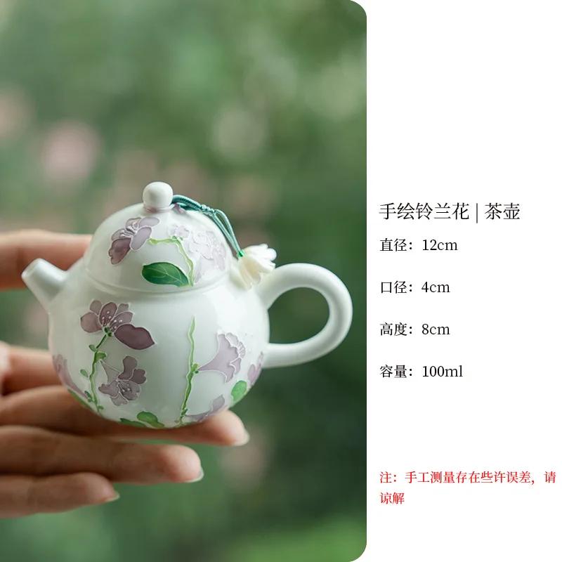 

Расписанный вручную белый фарфоровый чайник-колокольчик с орхидеей, домашний керамический фильтр, удобный заварочный чайник, чайный сервиз Kung Fu, аксессуары