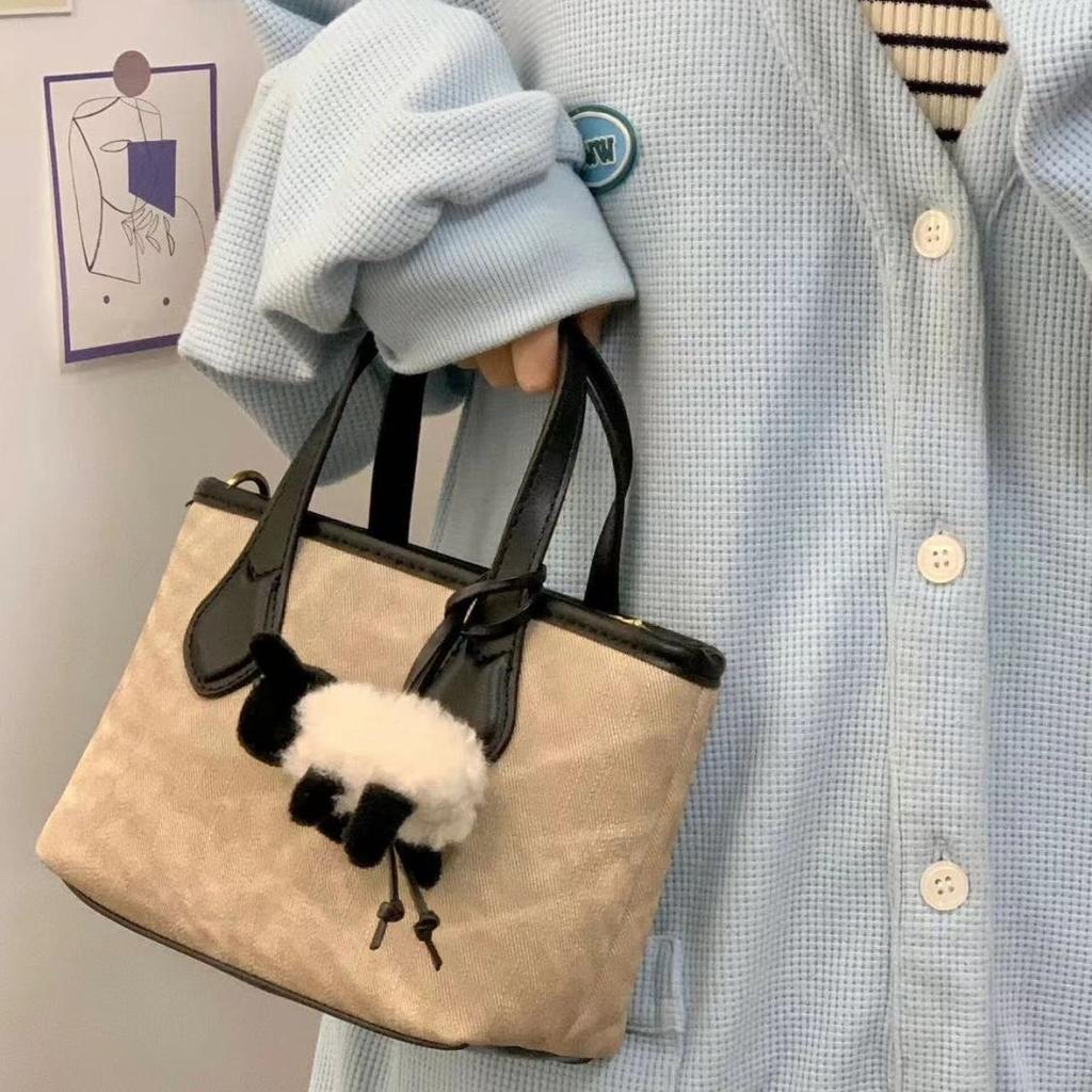 Portable bucket bag, women's retro spring popular vegetable basket bag, premium texture shoulder messenger bag