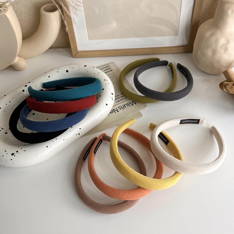 Das vielseitige High-Top-Haarband aus dünnem Schwamm im koreanischen Stil für Herbst und Winter ist ein neues Retro-Haarband in Bonbonfarben zum Ausgehen und für die Haarpresse