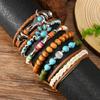 Cross-border new products European and American beaded alloy multi-layer retro bull head cat claw handwoven set bracelet