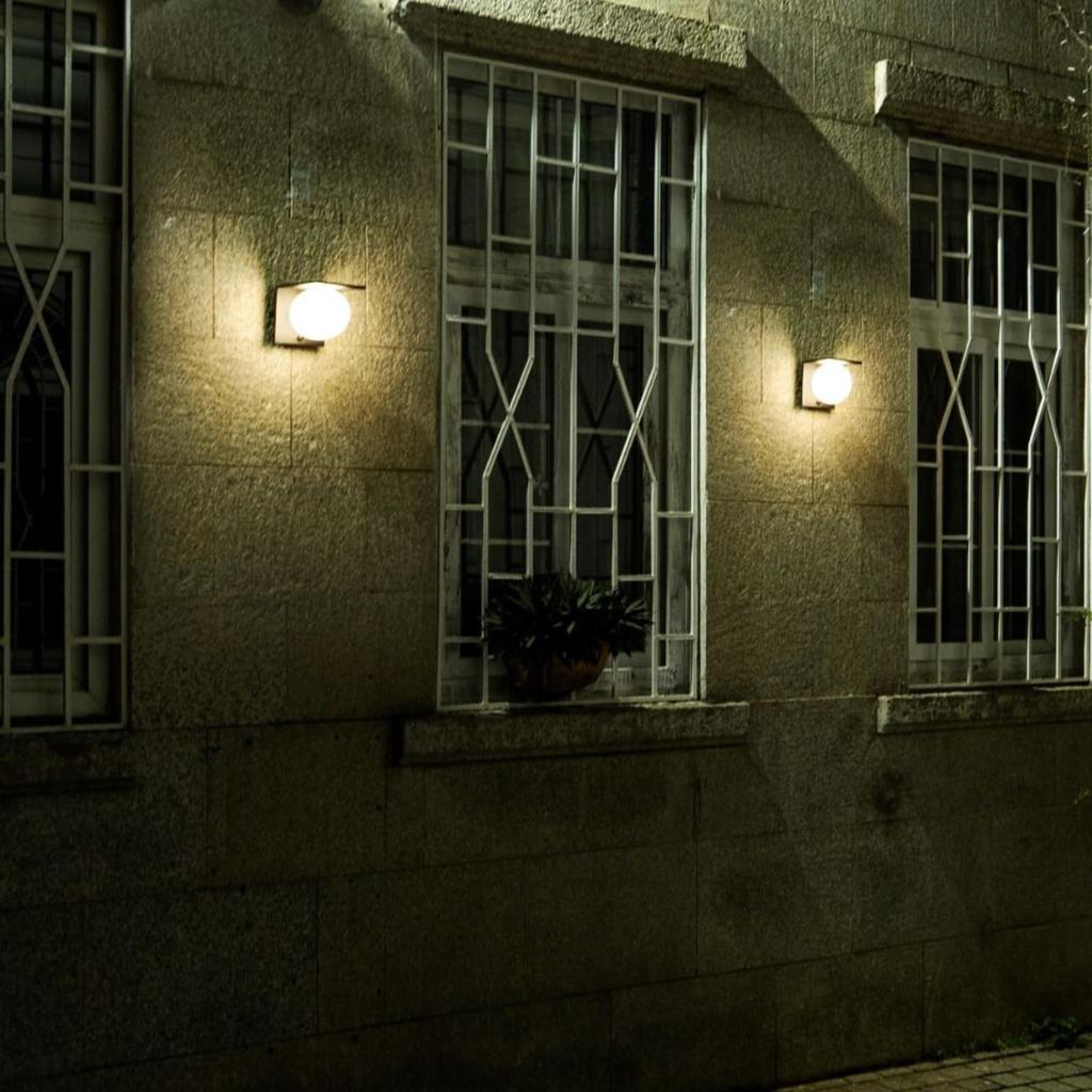 grecare Solar-Powered Outdoor Entryway Light with Motion Sensor, 1000lm, 2000mAh High Capacity, 4000k Daylight White, Automatic OnOff, Rainproof,