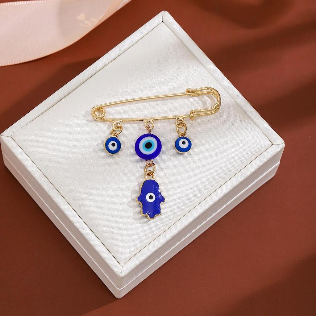 Creative Rhinestone Devil's Eye Tassel Brooch: Women's High-End Blue-Eyes Sweater Pin