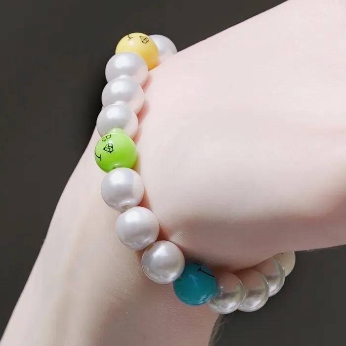 Bold Pearl Kitsch Smile Ball Bracelet