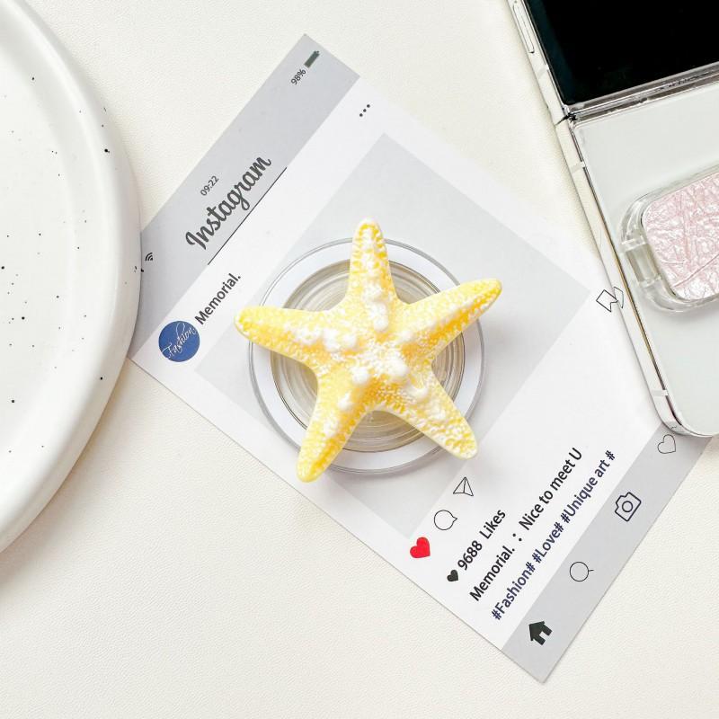 Korean Ins Mobile Phone Airbag Holder With Small Fresh Magnetic Suction Ma+.+.+starfish Expandable Desktop Watching Following TV Shows
