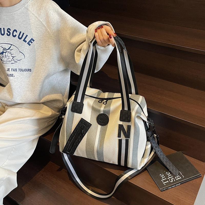 Travel bag Premium sense Large capacity fitness Sports storage Shoulder bag Business trip Striped wear-resistant messenger