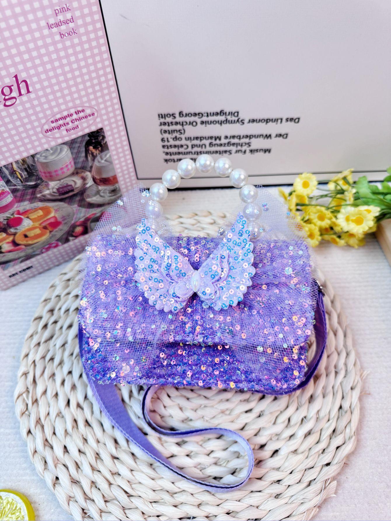 

Cute girls bag:butterfly&pearl details,cartoon rabbit design—crossbody/handheld!Princess-style,perfect for little fashionistas.