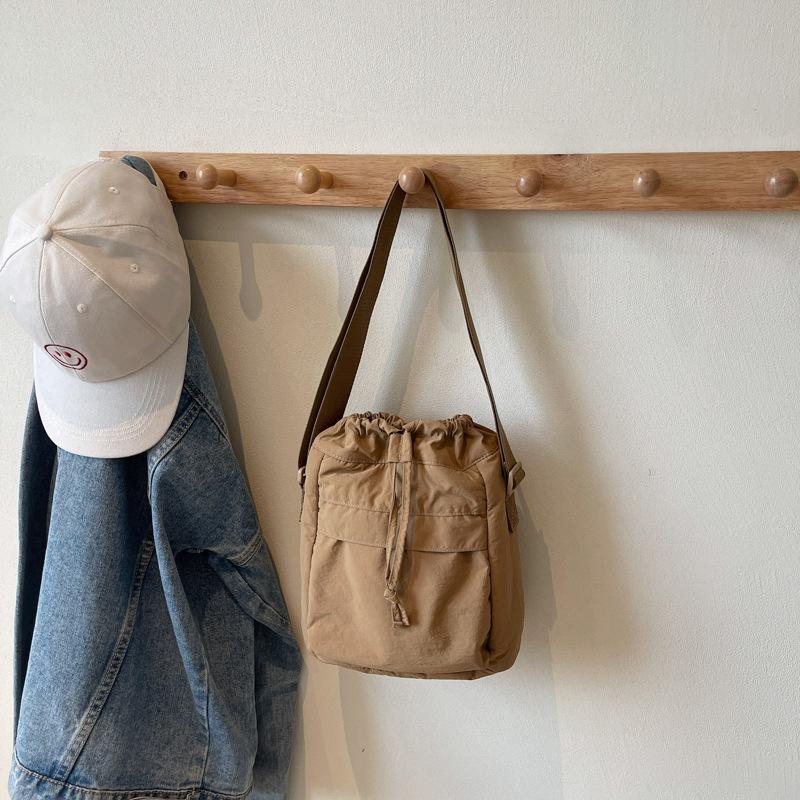 Japanese Personalized Small Square Bag Women'S Versatile Casual Nylon Cloth Drawstring Mobile Phone Bag Commuter Shoulder Messenger Bag