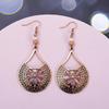 Vintage-Style Teardrop Earrings: Alloy with Cat's Eye and Hollow Design for Women