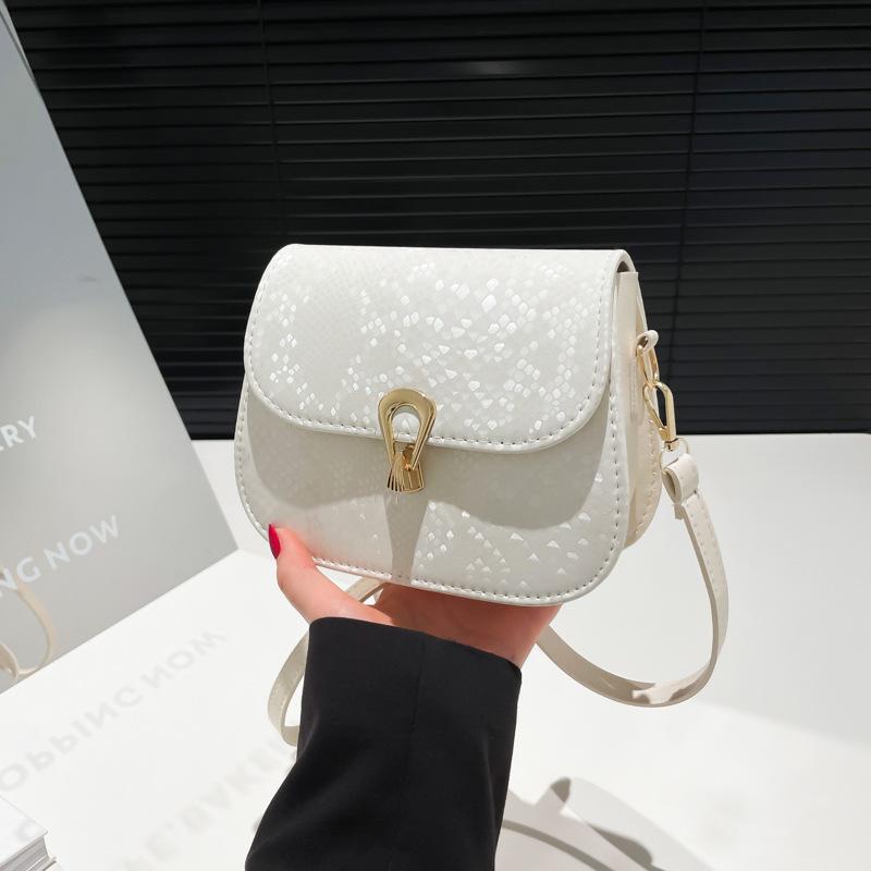 Damenhandtasche im ausländischen Stil mit Webmuster, Frühjahr 2025, schlichte kleine quadratische Tasche, modische einfarbige Retro-Umhängetasche mit Verschluss, Schultergurt