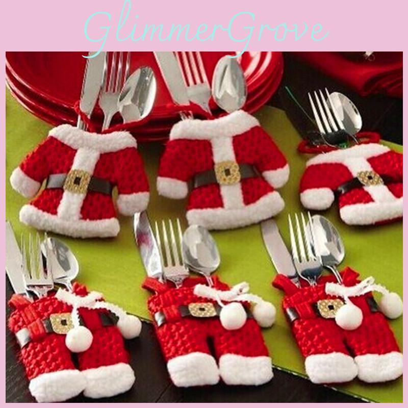 Unique Christmas Table Dcor With Whimsical Cloth Cutlery Wraps And Mini Garments For Festivities