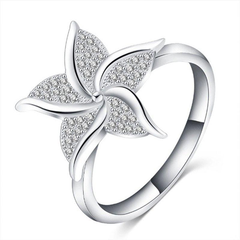 Stunning Fashion Windmill Shape Ring With Silver Plated Flower Design For Women