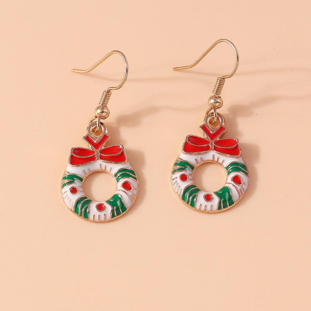 Weihnachtselch & Weihnachtsmann Schneeflocken-Ohrringe mit Persönlichkeit