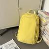 Solid color high-end backpack junior high school students casual simple travel large-capacity backpack