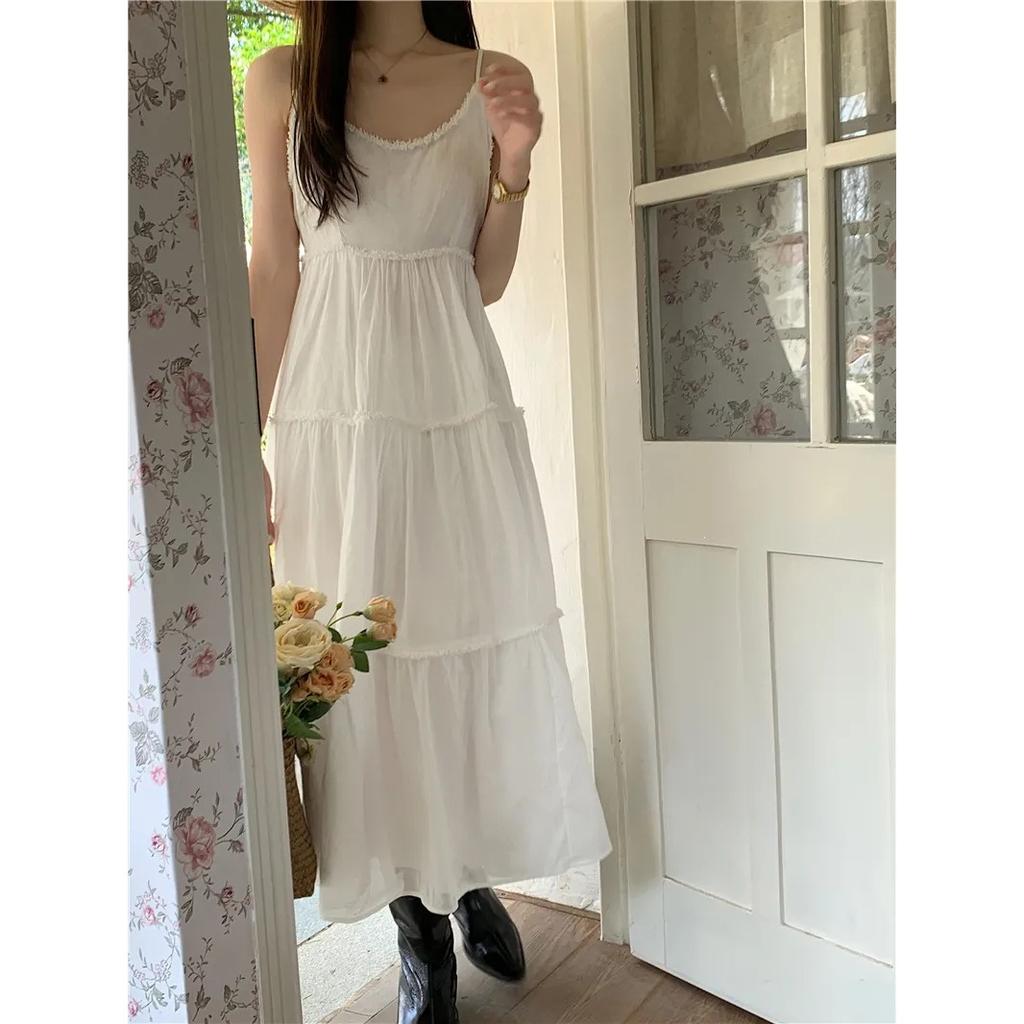 Summer new three-dimensional flocculent line design milk white suspender dress, thin and versatile long dress women