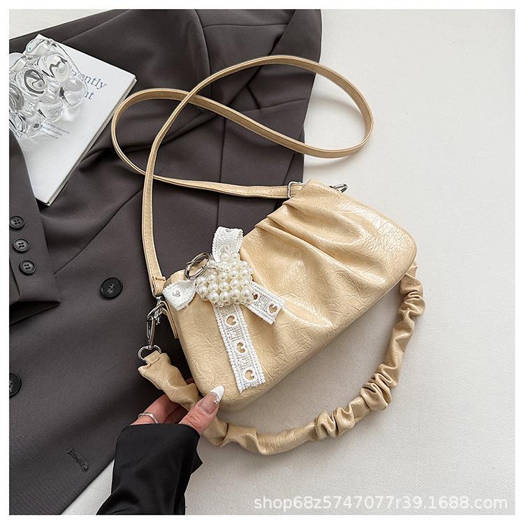 Niche design bag women's 2025 new casual Korean version messenger bag fashion shoulder pleated cloud bag