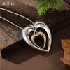 New hollow two-color love snake bone chain pendant, women's fashion high-end glossy heart-shaped neck chain