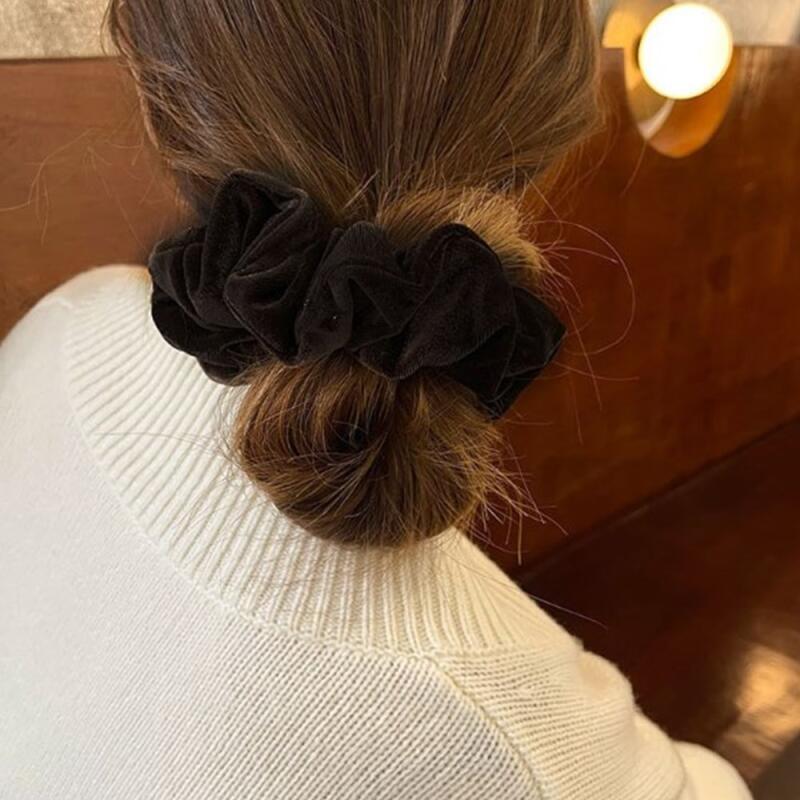 Velvet patternless solid black hair tie with a slit