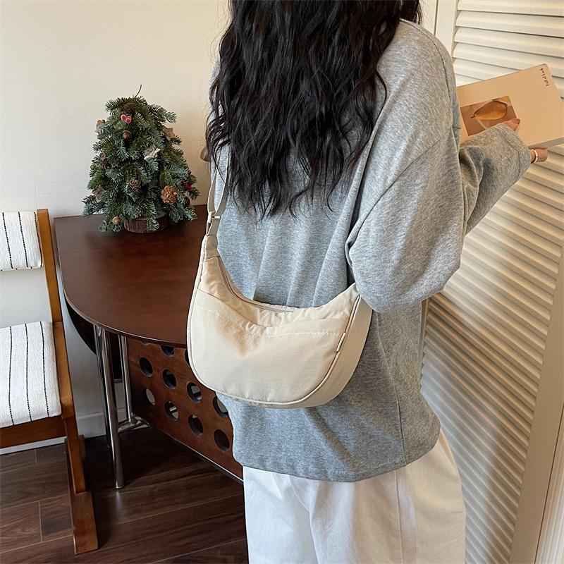 Minimalist Crossbody Bag with Adjustable Strap and Front Zip Pocket Lightweight Everyday Shoulder Bag