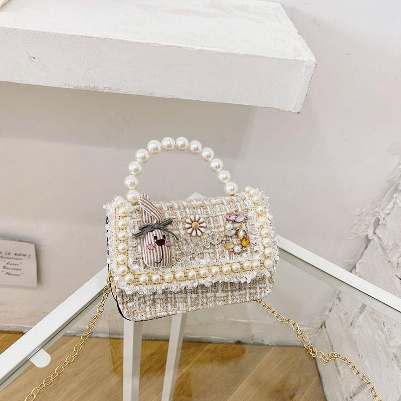 Stylish Mini Girls Handbag With Pearl Bow Design For Fashionable Princesses In Black And White Colors