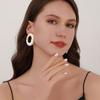 New earrings light luxury high sense niche simple earrings metal hollow earrings Europe and America